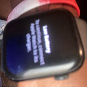 Black Smartwatch with Red and White Band